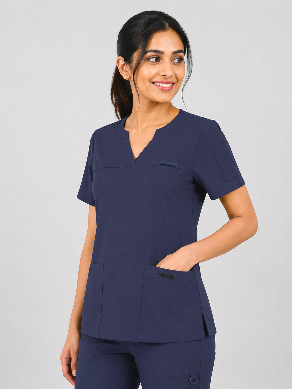 Product - The Pria-Notch Neck Scrub Top